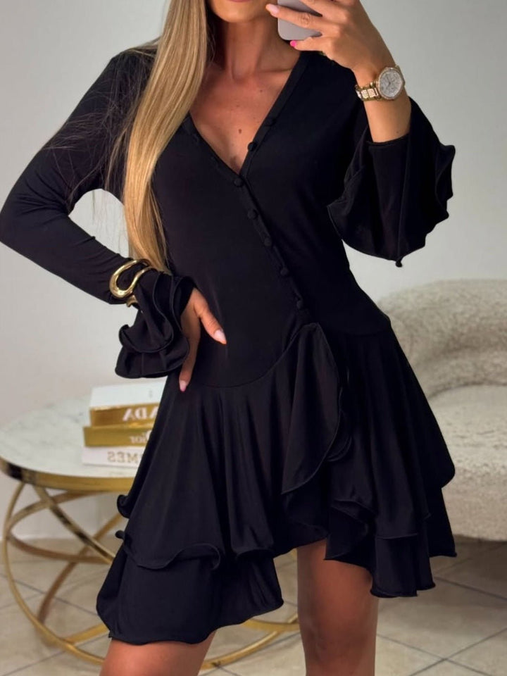 Abito scollo a v elasticizzato la gonna presenta un elegante volant a balza Nero Level Stores