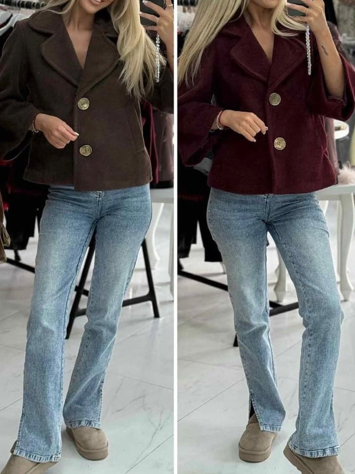 Cappotto in panno modello corto caratterizzato da chiusura a doppio bottone e tasche laterali Nero Level Stores