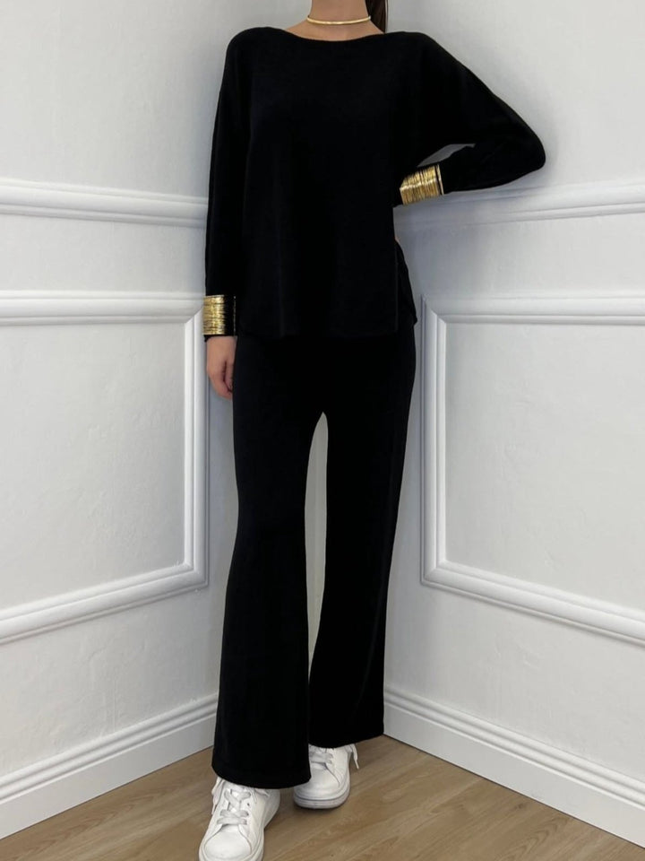 Completo composto da maglia in lana abbinato a pantaloni palazzo con vita elastica, morbido e caldo Nero Level Stores