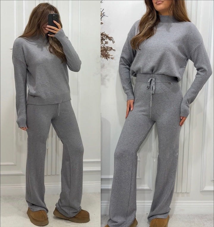 Completo composto da maglia in lana collo alto abbinato a pantaloni palazzo con vita elastica, morbido e caldo Grigio Level Stores