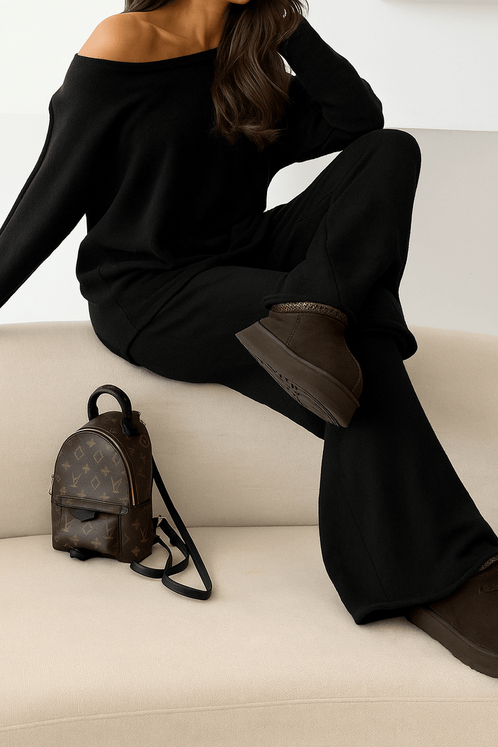 Completo composto da maglia in lana scollo a v abbinato a pantaloni palazzo con vita elastica, morbido e caldo Nero Level Stores