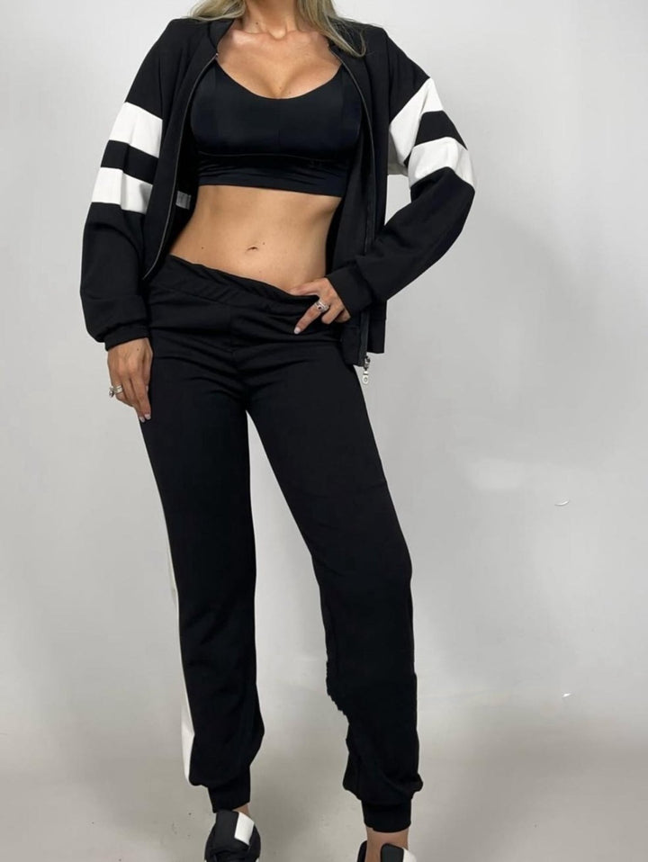 Completo composto da tuta in felpa con zip e pantaloni elastico in vita Nero Level Stores