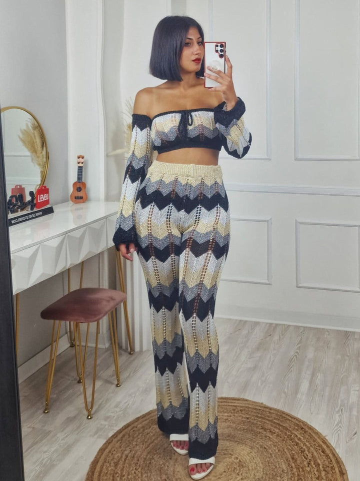 Completo effetto uncinetto traforato in lurex multicolore composto da top e pantalone a zampa con elastico in vita elasticizzato Nero Level Stores