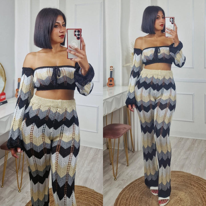 Completo effetto uncinetto traforato in lurex multicolore composto da top e pantalone a zampa con elastico in vita elasticizzato Nero Level Stores