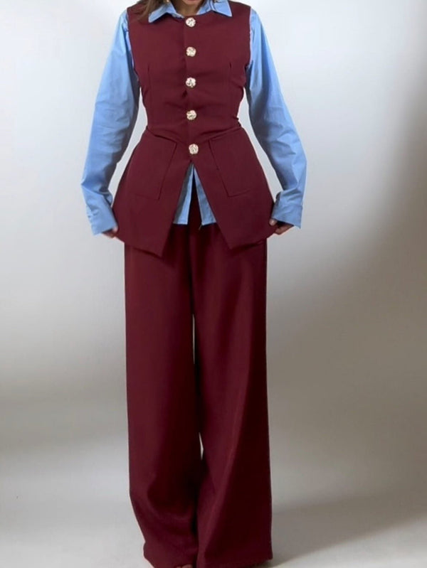 Completo formato da gilet con bottoni e tasche abbinato a pantaloni palazzo vita elasticizzata Bordo Level Stores