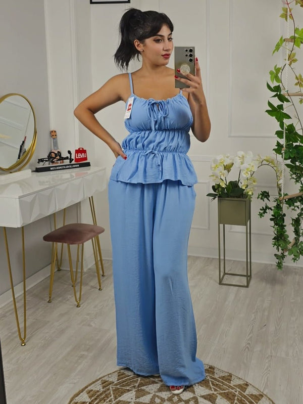 Completo in chiffon top con bretelle coppe preformate con volant con fascia arricciata elasticizzato e pantalone palazzo - Nero - Level Stores