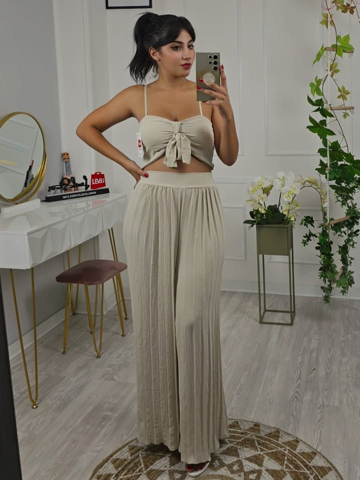 Completo in chiffon top con coppe preformate con spalle regolabile e pantalone palazzo plissettato elasticizzato - Nero - Level Stores