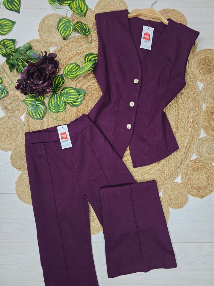 Completo in due pezzi gilet con bottone aderente pantalone a zampa con elastica in vita elasticizzato Nero Level Stores