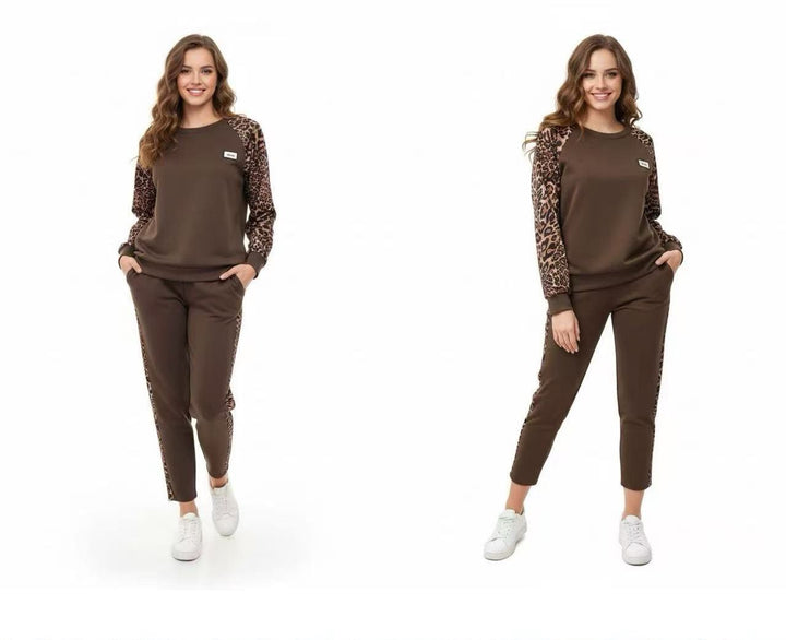 Completo tuta composto da felpa e pantaloni elastico in vita con fantasia maculato Nero Level Stores