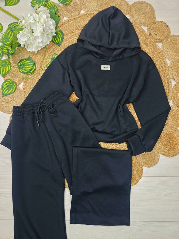 Completo tuta formato da felpa con cappuccio e pantaloni con elastico in vita modello palazzo Nero Level Stores