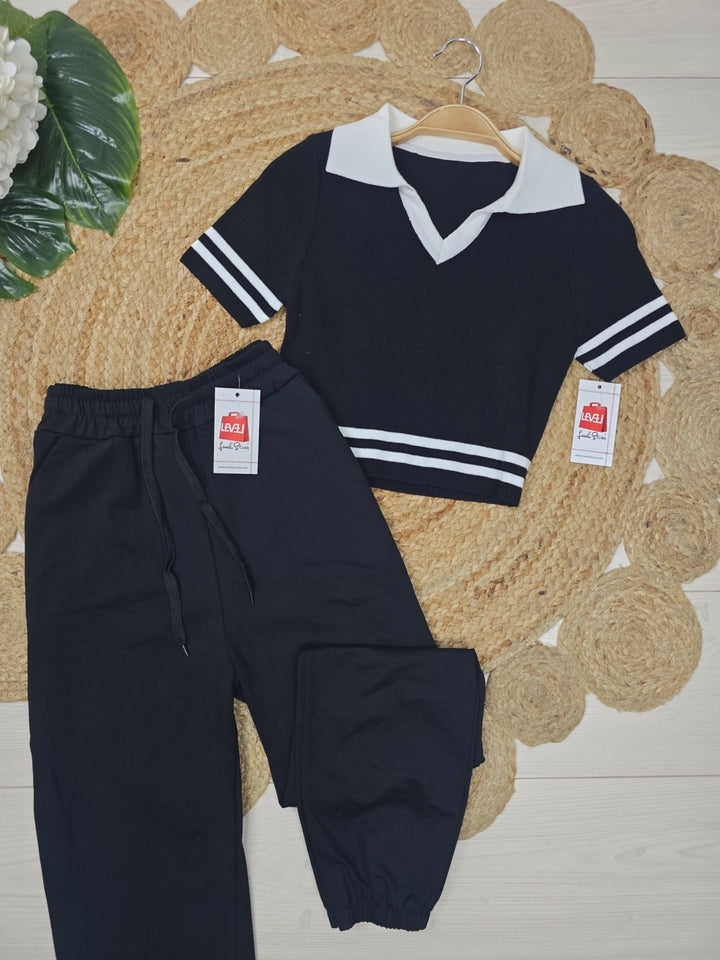 Maglia a costine modello corto aderente elasticizzato manica corta Nero Level Stores