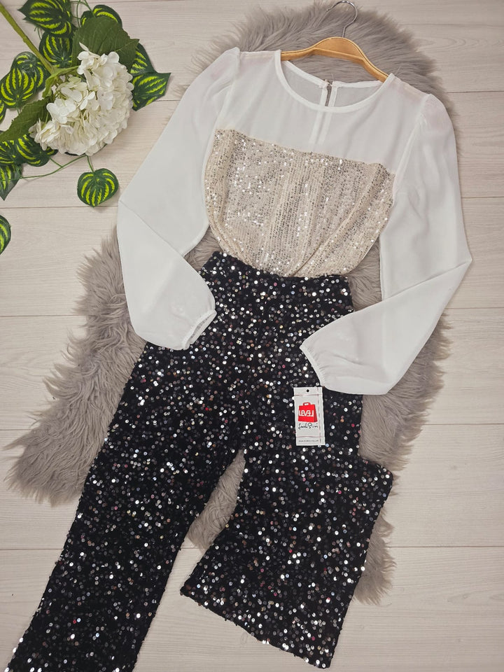 Pantalone a zampa lavorata su maglia elasticizzata con paillettes - Nero con paillettes argento - Level Stores