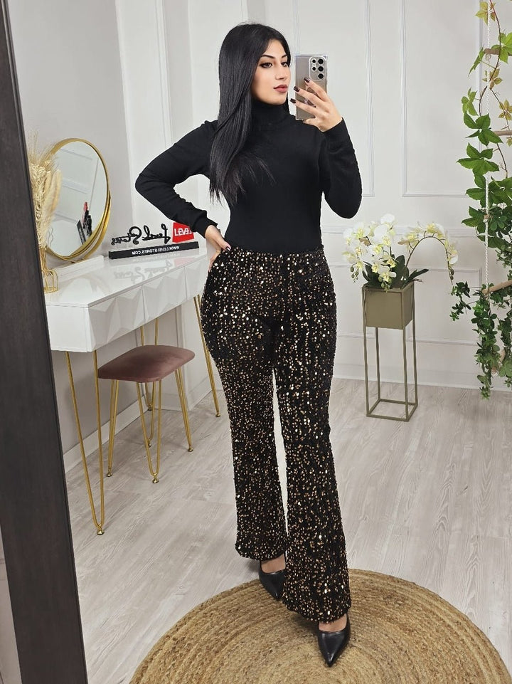 Pantalone a zampa lavorata su maglia elasticizzata con paillettes - Nero - Level Stores