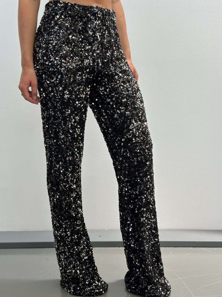 Pantalone a zampa lavorata su maglia elasticizzata con paillettes - Nero con paillettes argento - Level Stores