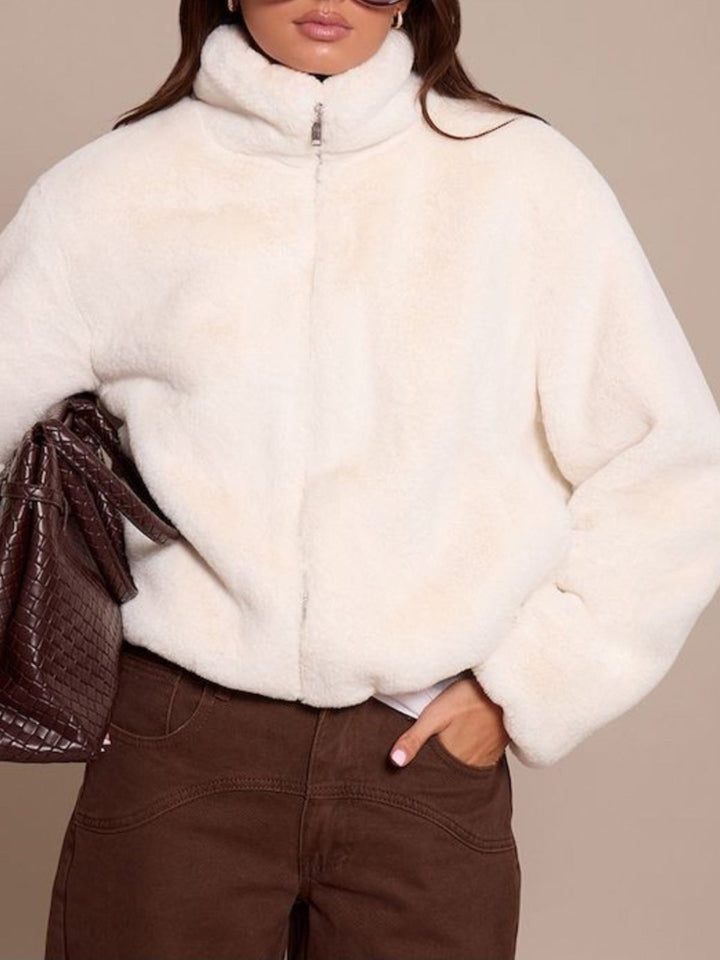 Pelliccia con zip dal tessuto soffice e caldo Bianco Level Stores