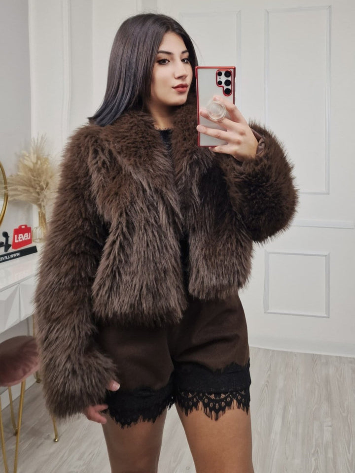 Pelliccia dal tessuto morbido e caldo Nero Level Stores