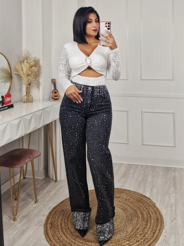 Jeans modello palazzo decorati con strass