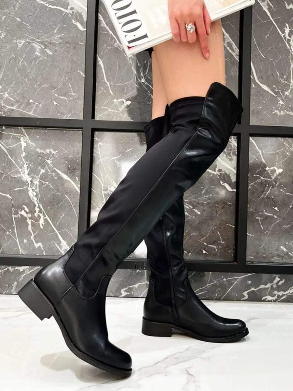 Stivale alto realizzato in ecopelle nera. Nero Level Stores