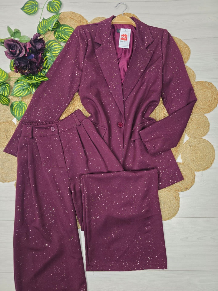 Tailleur in lurex con giacca foderata e bottoni, pantaloni palazzo morbidi con vita elastica Nero Level Stores